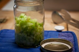 Put the rinsed diced cucumbers into the jar