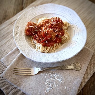 Mama Capra's marinara sauce with meatballs and gluten-free capellini